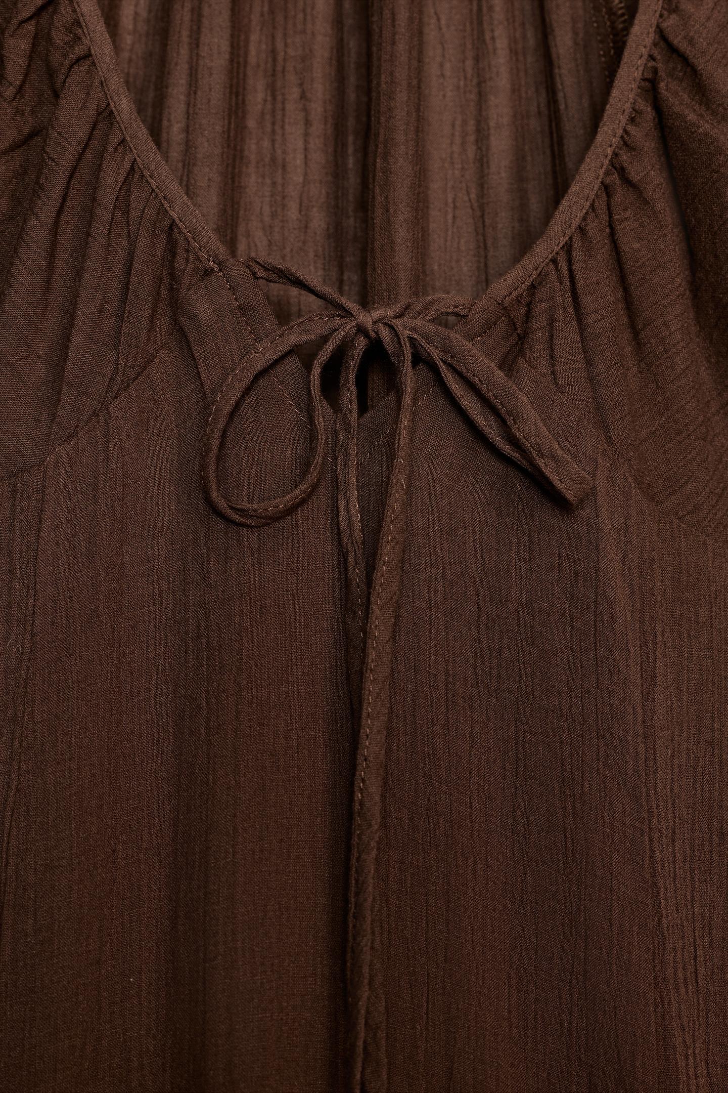 Robe mi-longue en gaze avec godets