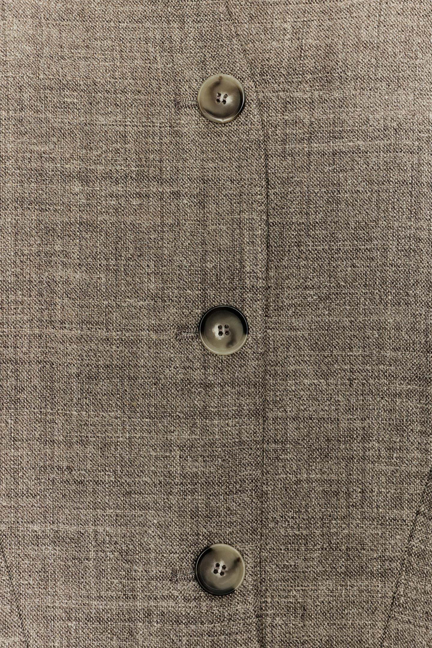 GILET COURT AVEC LAINE EZ SIGNATURE