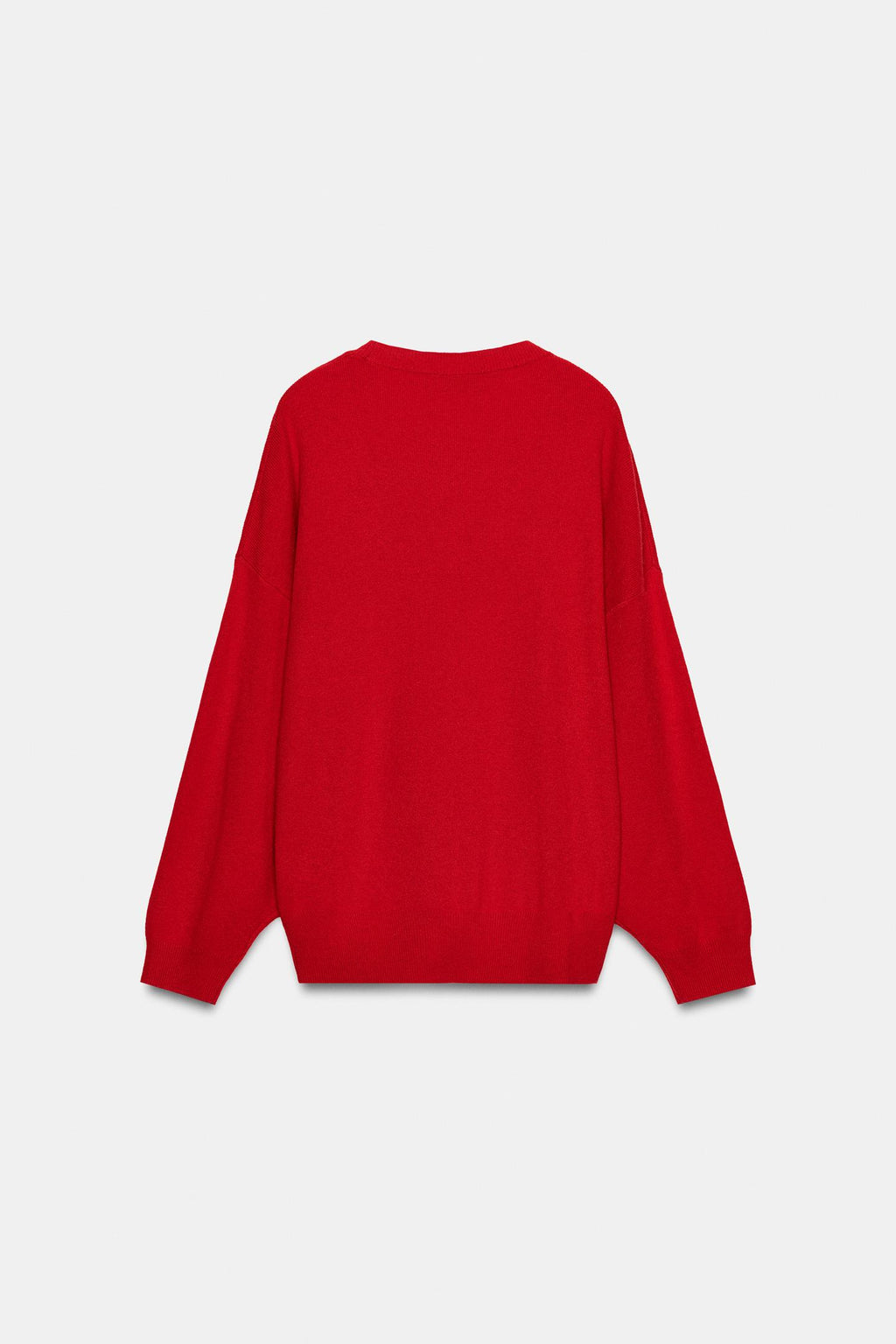 PULL EN MAILLE AVEC DÉCOLLETÉ PRONONCÉ