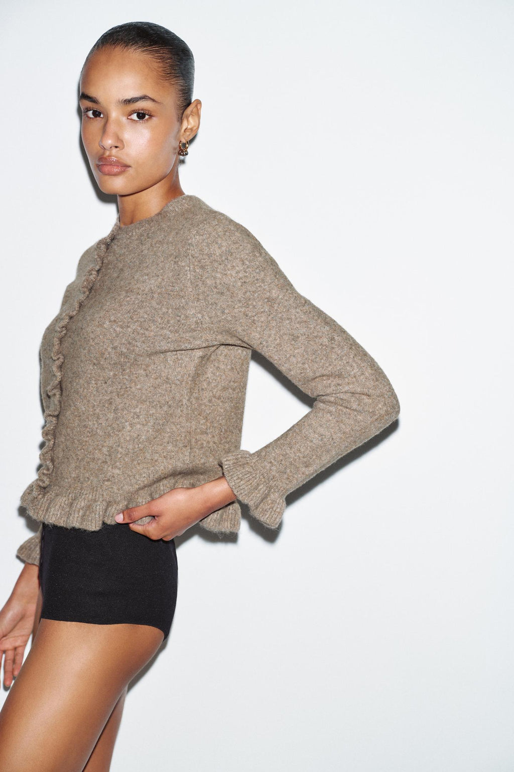 GILET EN MAILLE UNIE À VOLANTS