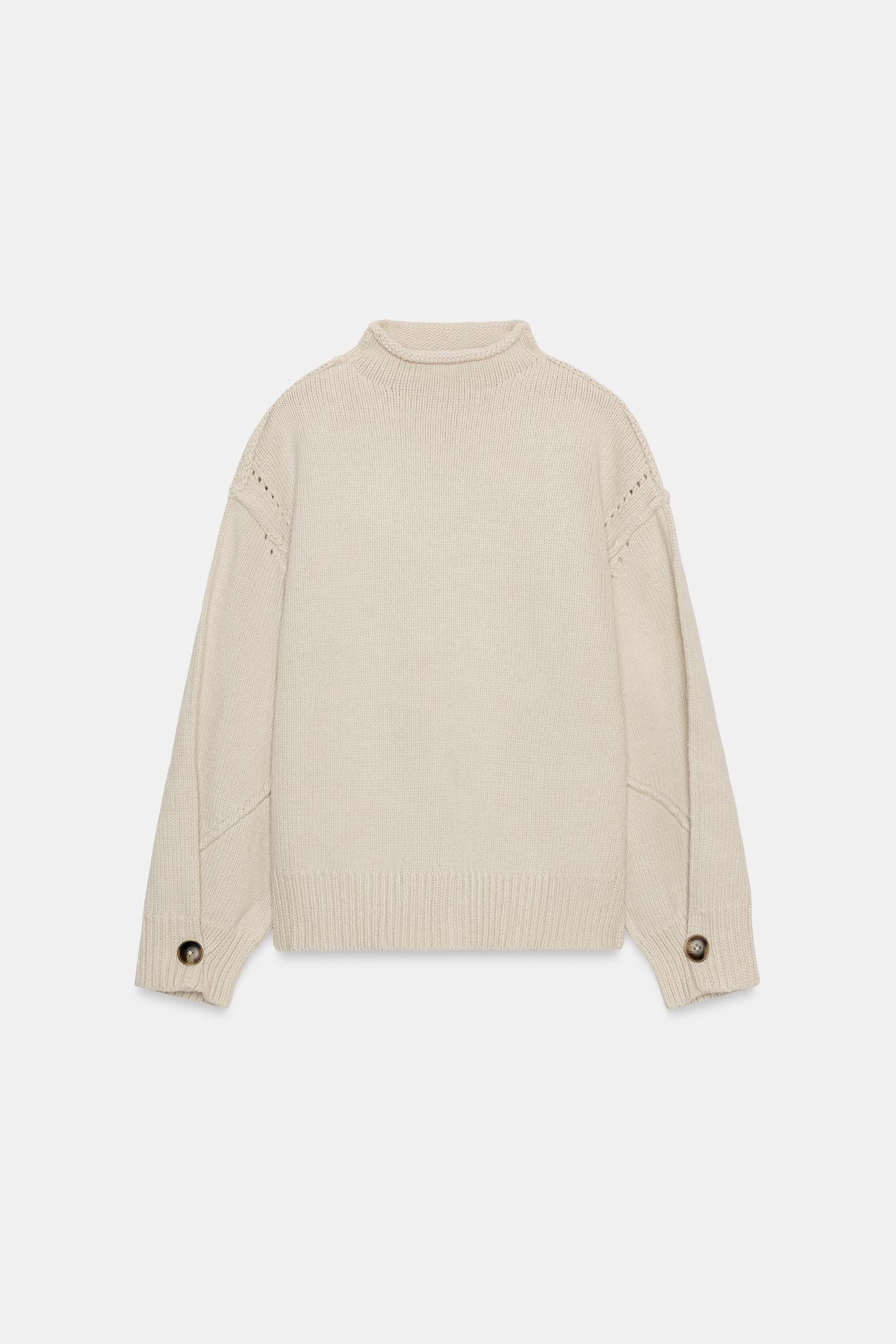 PULL EN MAILLE AVEC COUTURES