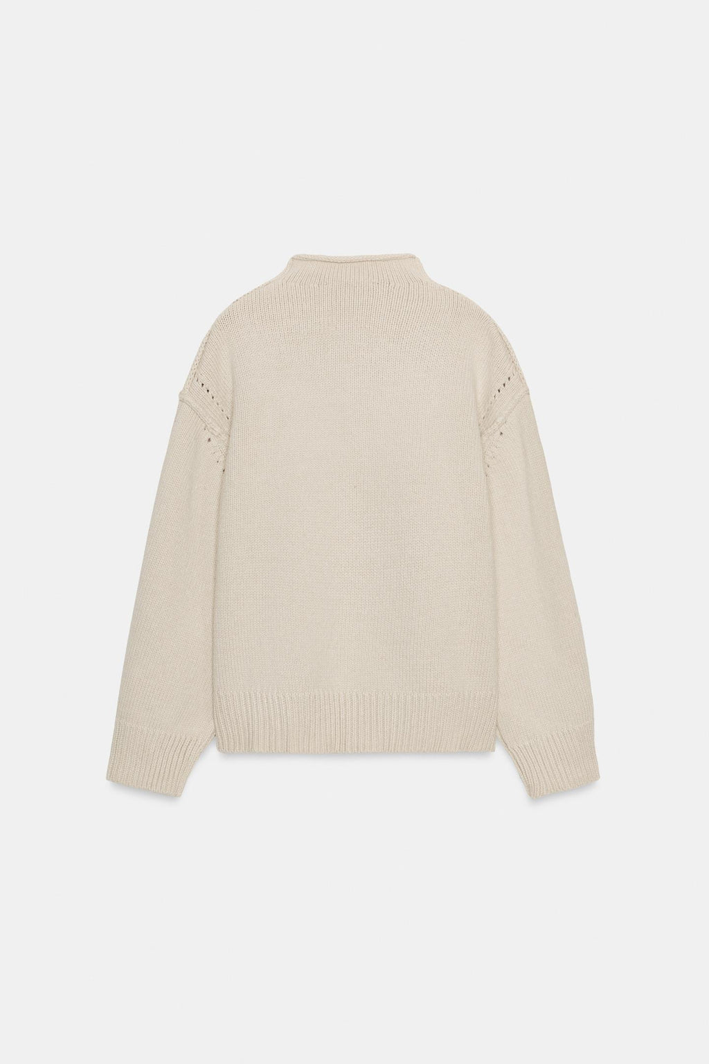 PULL EN MAILLE AVEC COUTURES