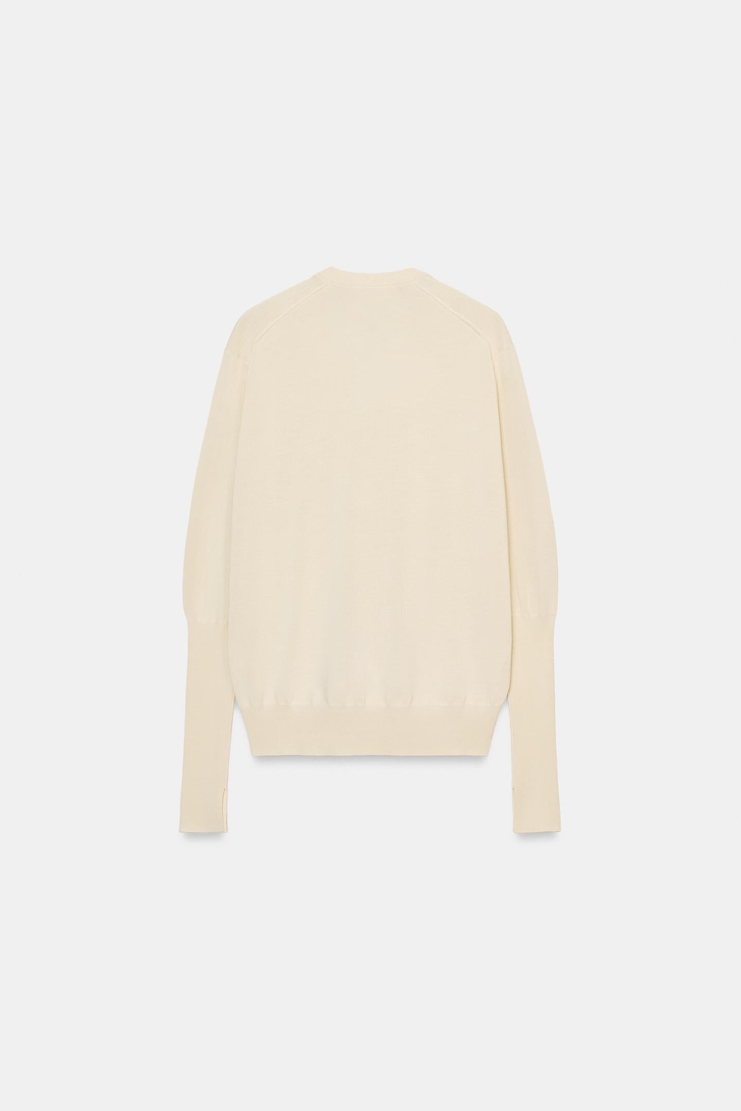 PULL EN MAILLES EXTRAFINES À COL EN V