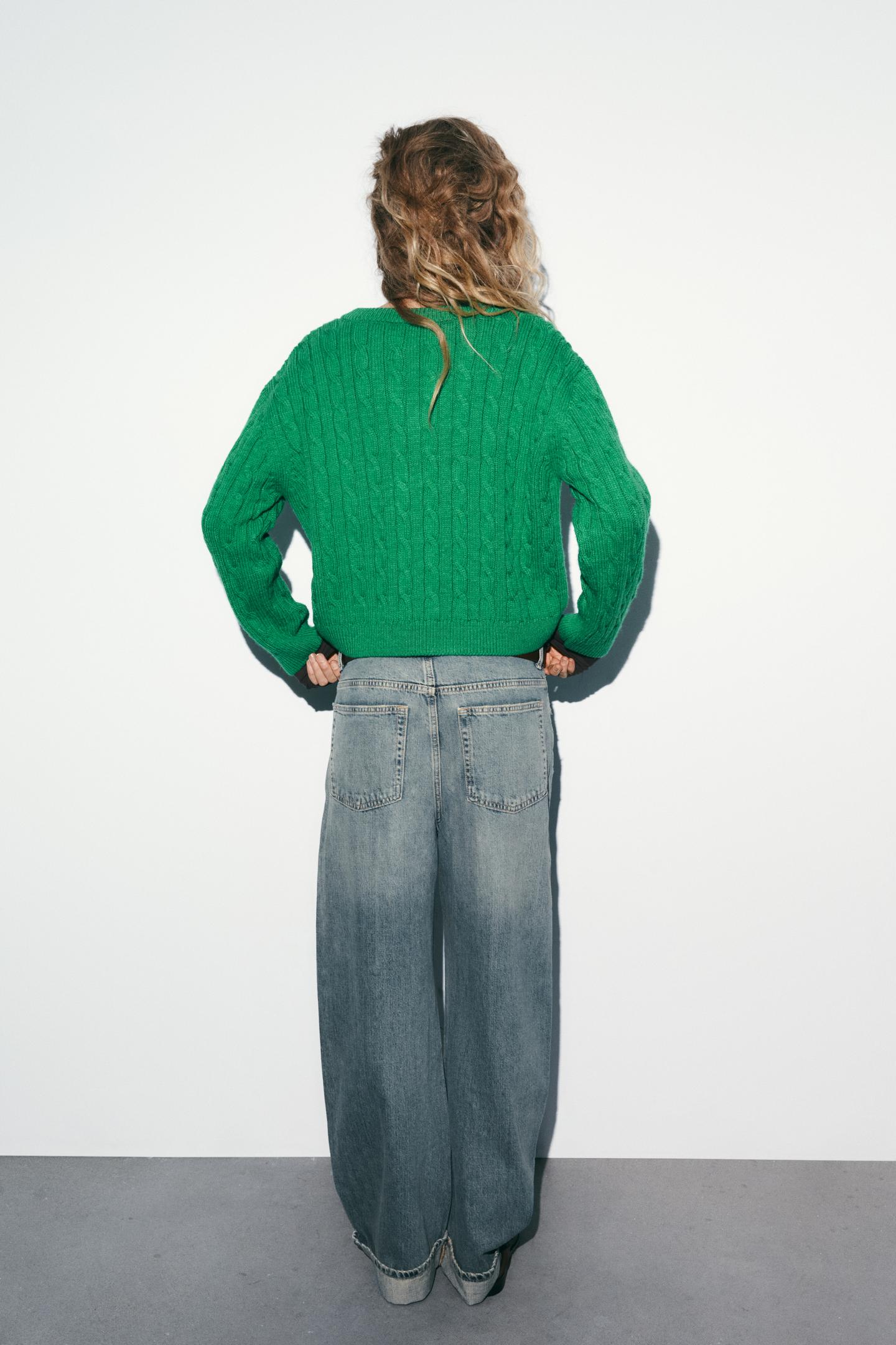 PULL EN V EN MAILLE À TORSADES
