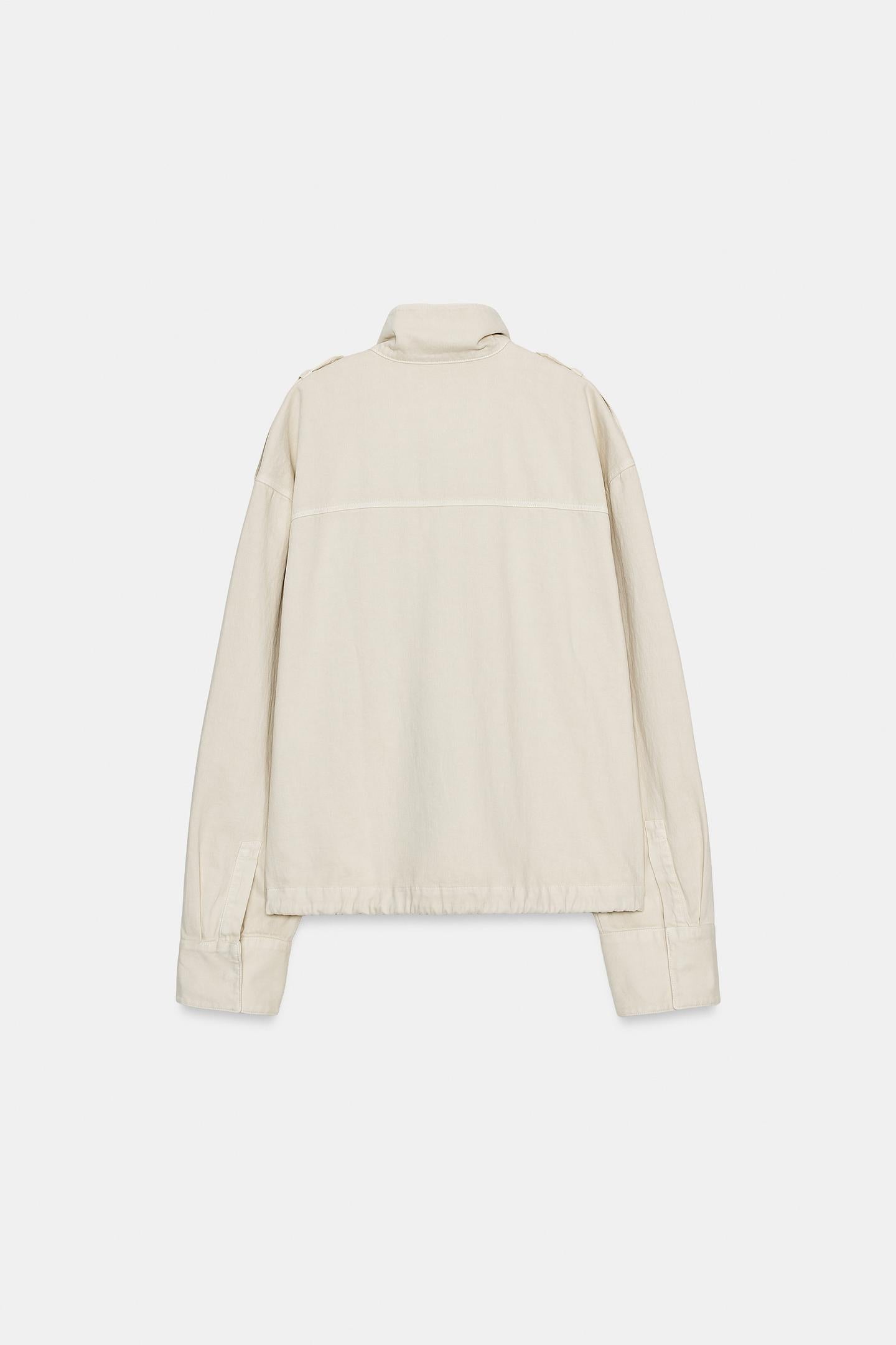 VESTE COL MONTANT