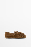 MOCASSIN À FRANGES ET POMPONS EN CROÛTE DE CUIR