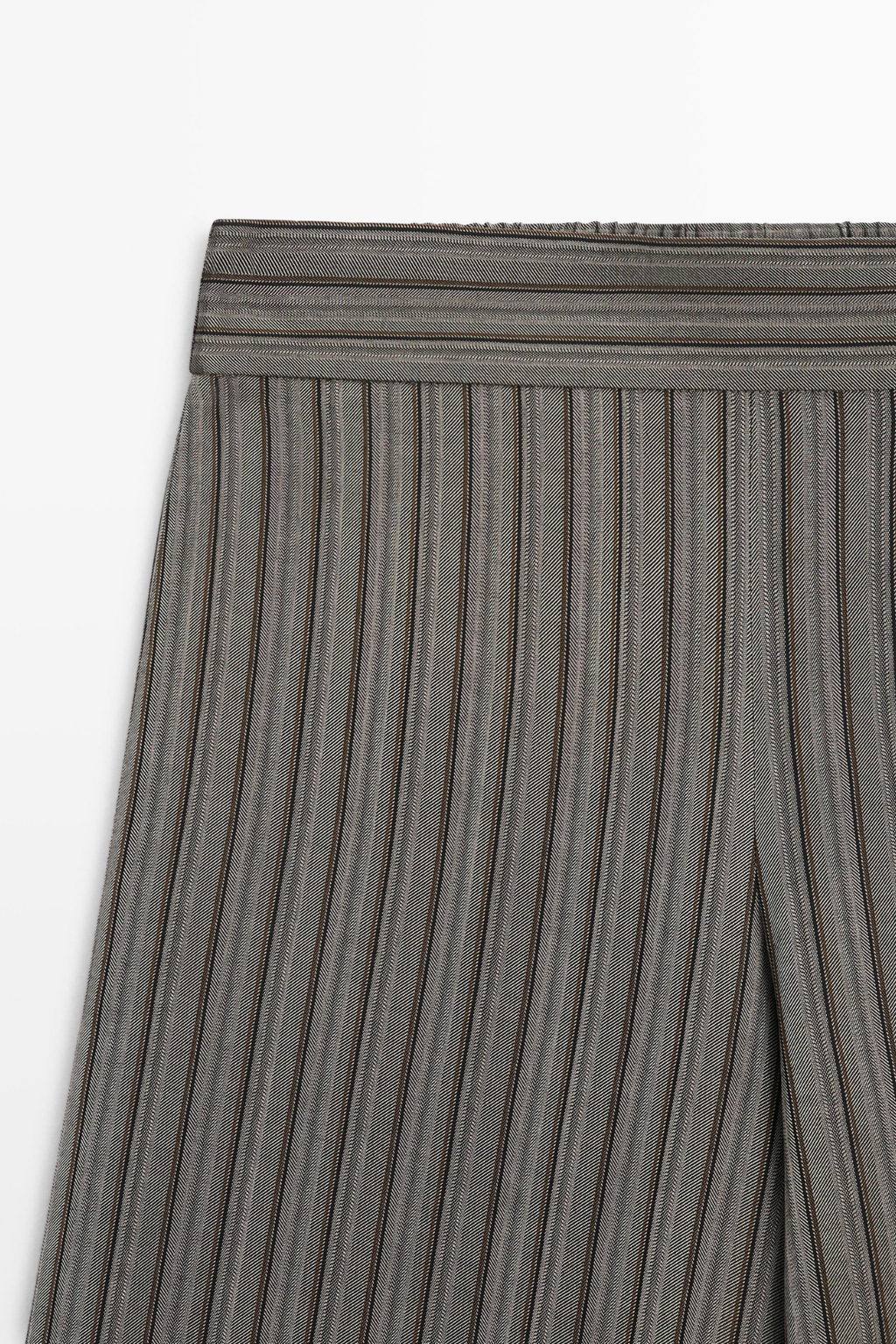 PANTALON LARGE À RAYURES